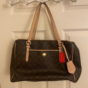 Coach handbag. Excellent condition. Color: brown with coach logo all over.
